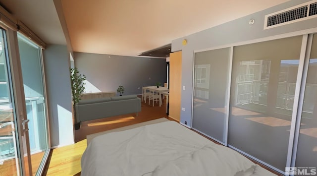 bedroom featuring light wood-type flooring