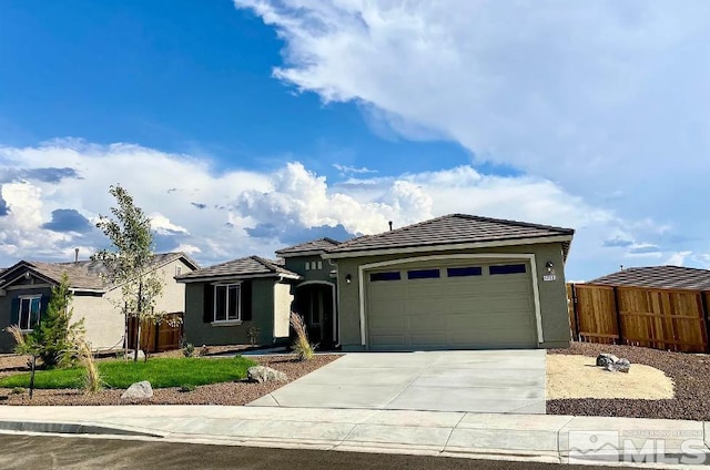 view of front of property featuring a garage