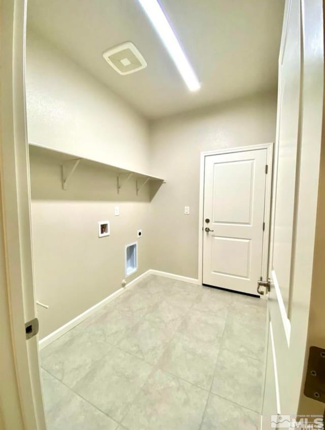 clothes washing area featuring washer hookup, hookup for an electric dryer, and gas dryer hookup