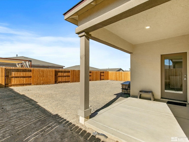view of patio with a fenced backyard