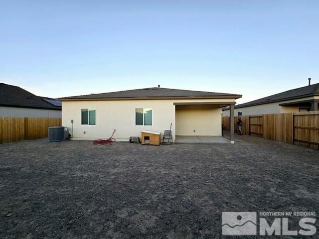 rear view of house featuring a patio