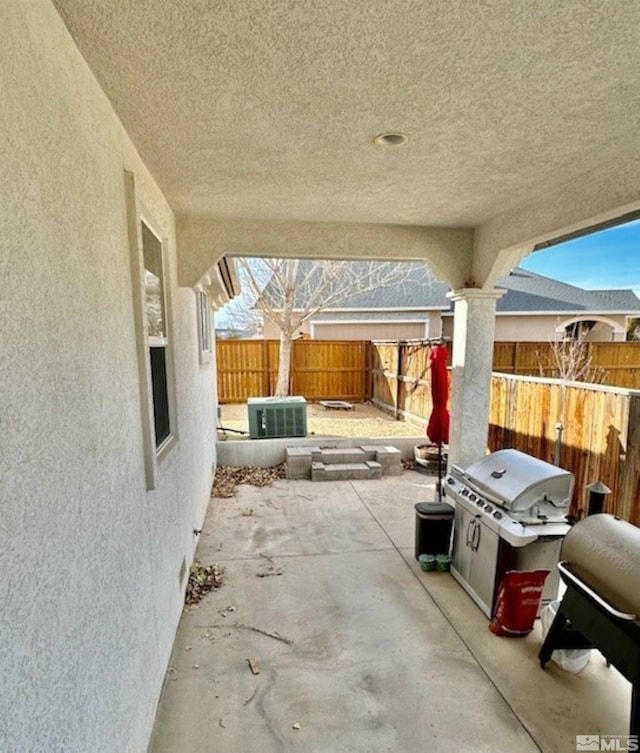 view of patio featuring area for grilling and central AC unit