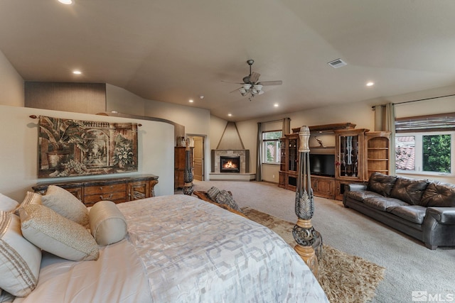 bedroom featuring ceiling fan and light carpet