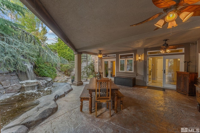 view of patio / terrace with ceiling fan and french doors