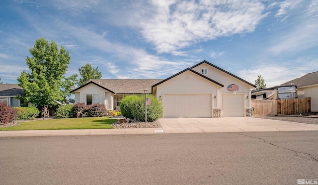 ranch-style home featuring a front yard and a garage