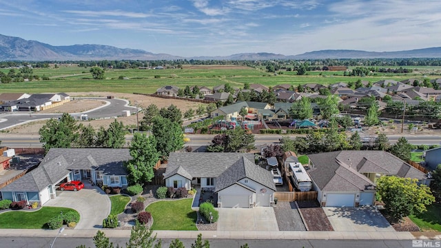 drone / aerial view featuring a mountain view