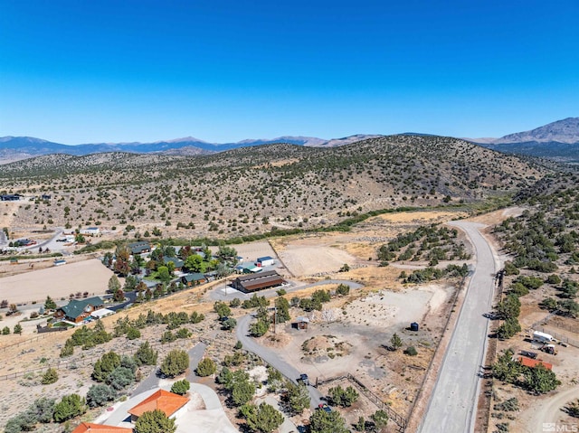 bird's eye view with a mountain view and a desert view
