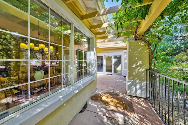 balcony featuring french doors