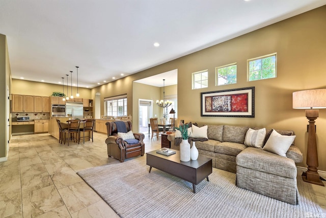 living room featuring an inviting chandelier