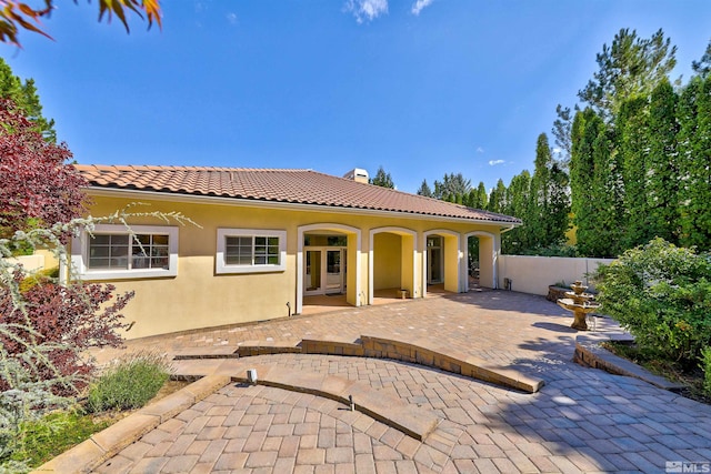 view of front of house with a patio