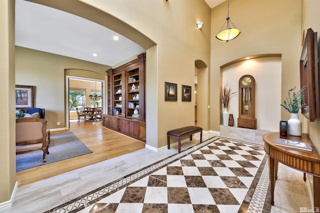 entrance foyer with light hardwood / wood-style flooring