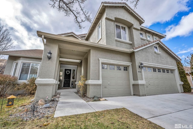 view of front of property with a garage