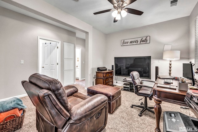 office featuring ceiling fan and light colored carpet