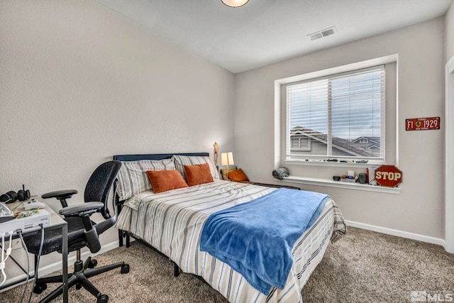 bedroom featuring carpet