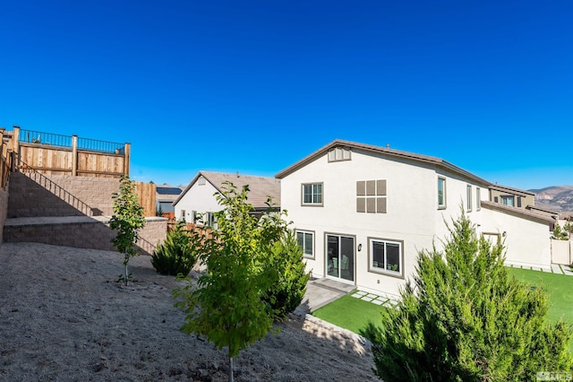 rear view of property with a patio