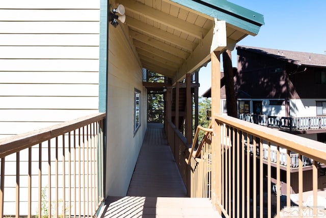 wooden balcony featuring a wooden deck