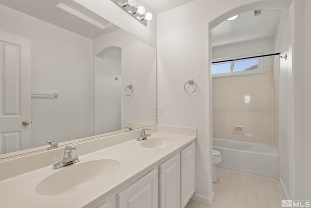 full bathroom featuring shower / tub combination, vanity, and toilet