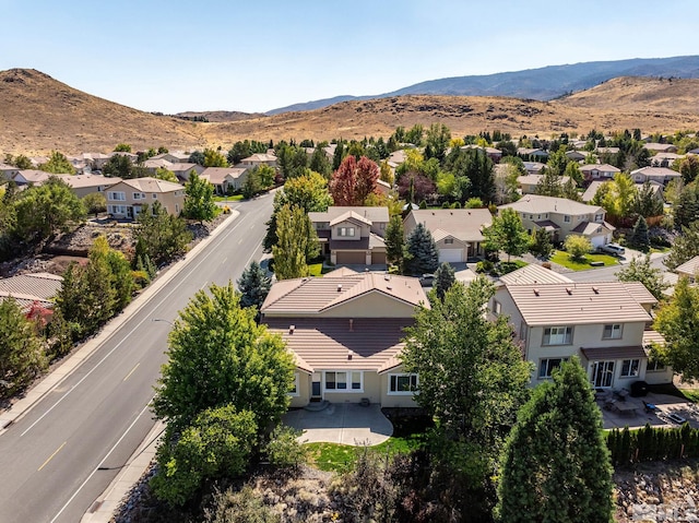 drone / aerial view featuring a mountain view