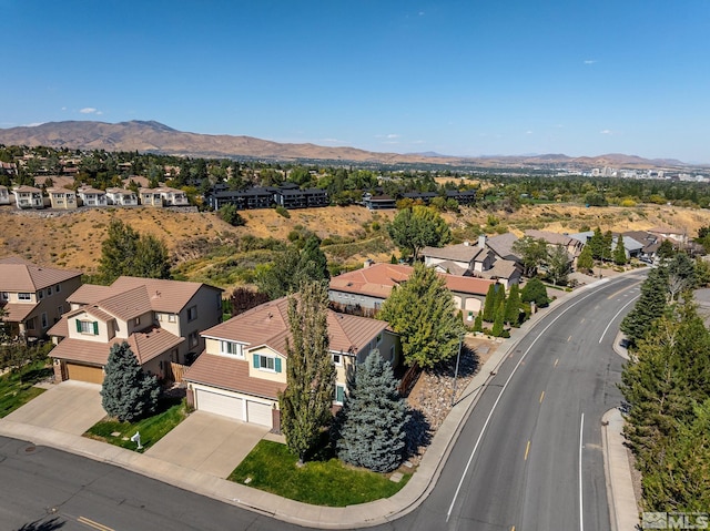 drone / aerial view featuring a mountain view