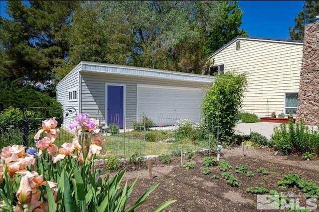 view of outdoor structure with a garage