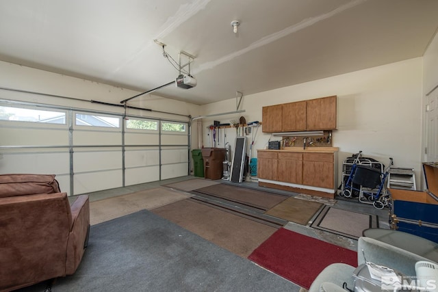 garage featuring a garage door opener