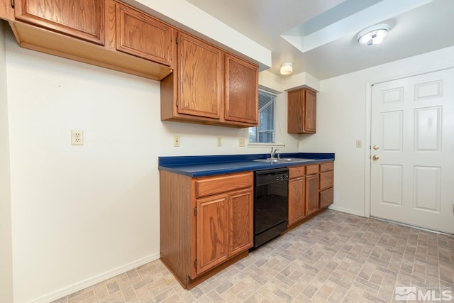 kitchen featuring black dishwasher and sink