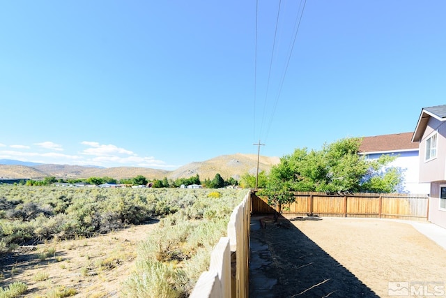 exterior space featuring a mountain view