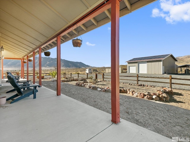 view of patio with a mountain view