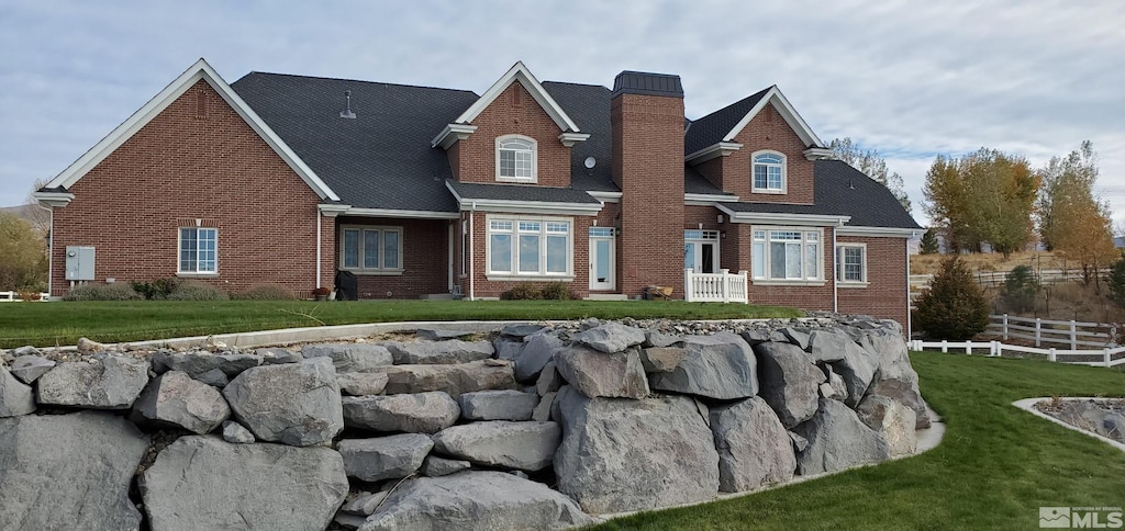 view of front of home with a front yard