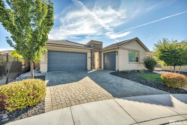 single story home with a garage