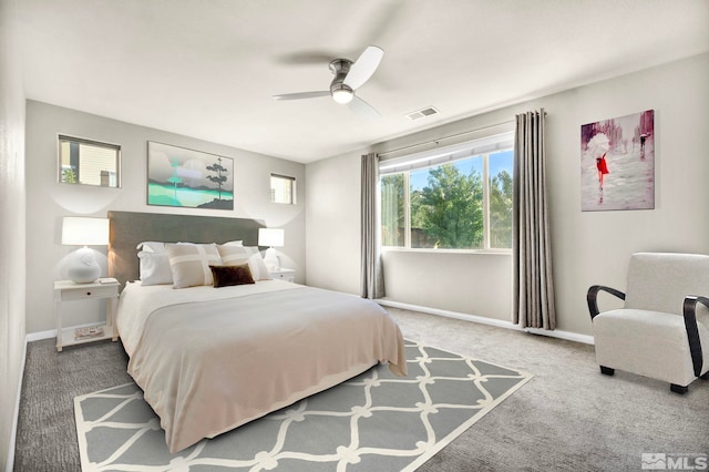 carpeted bedroom with ceiling fan