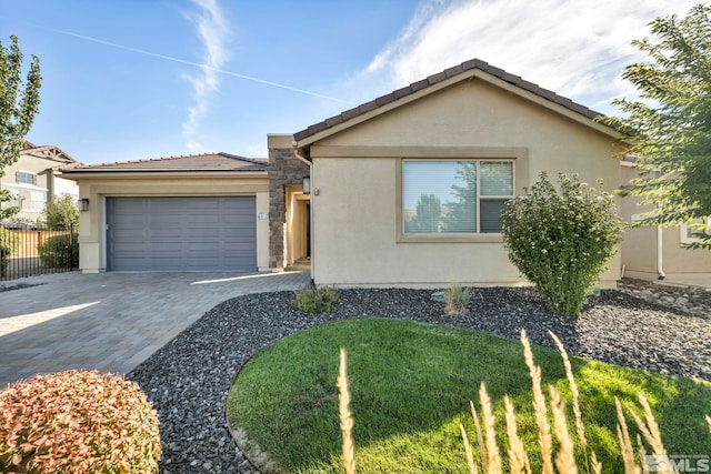 single story home with a garage