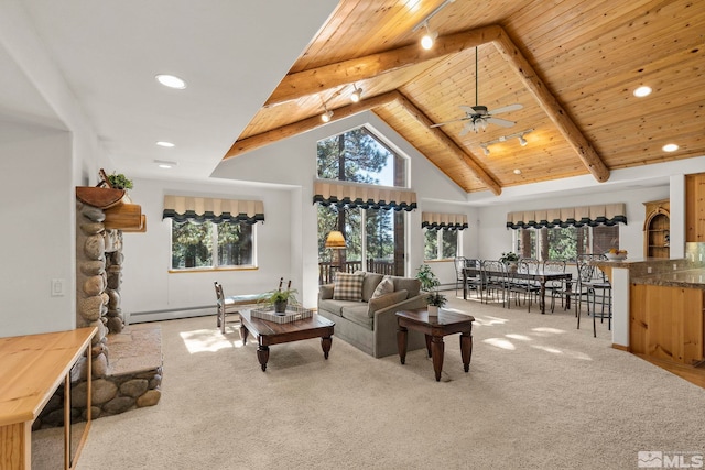 carpeted living room featuring a fireplace, ceiling fan, wooden ceiling, and a healthy amount of sunlight