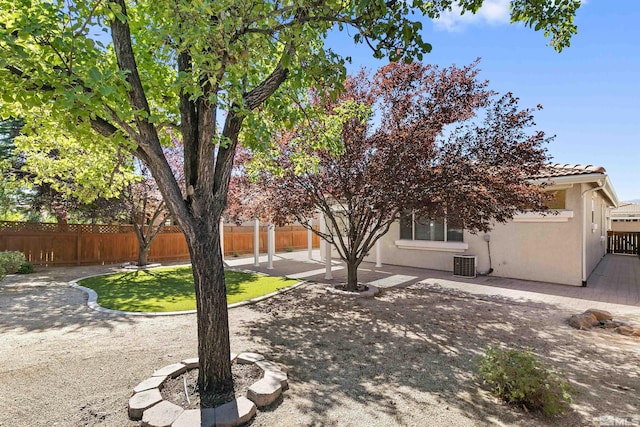 view of yard with a patio and cooling unit