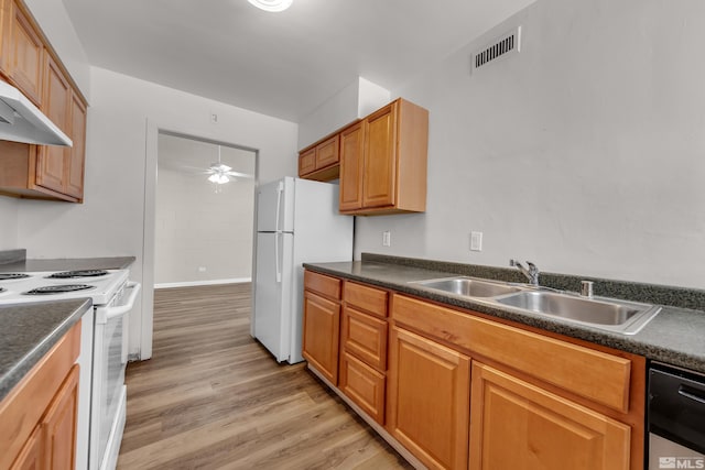 kitchen with exhaust hood, sink, light wood-type flooring, white appliances, and ceiling fan