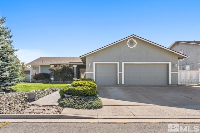 single story home featuring a front lawn and a garage