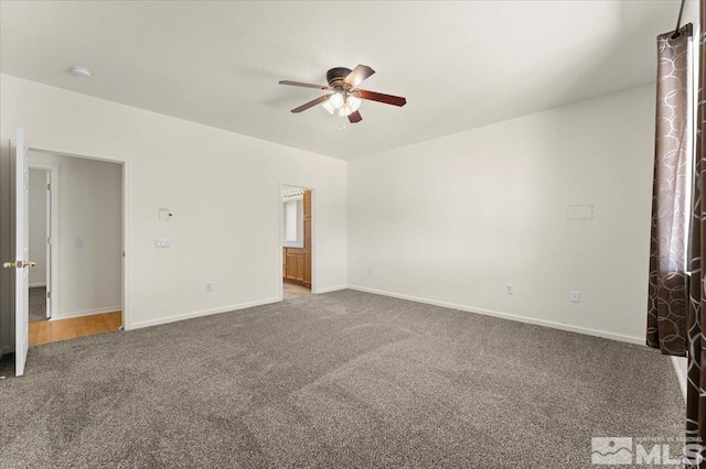 unfurnished bedroom with ceiling fan and carpet flooring