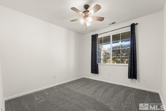 empty room featuring ceiling fan and carpet flooring