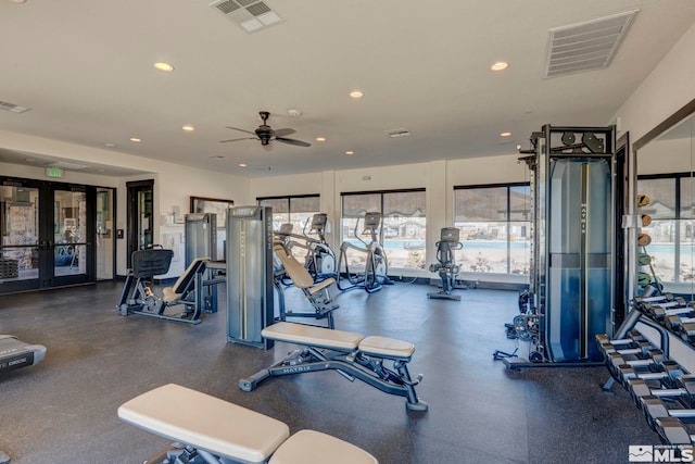 exercise room with ceiling fan