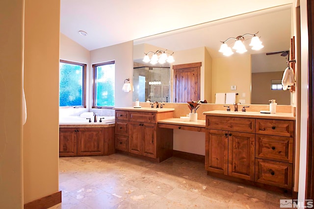 bathroom with vaulted ceiling, independent shower and bath, and vanity