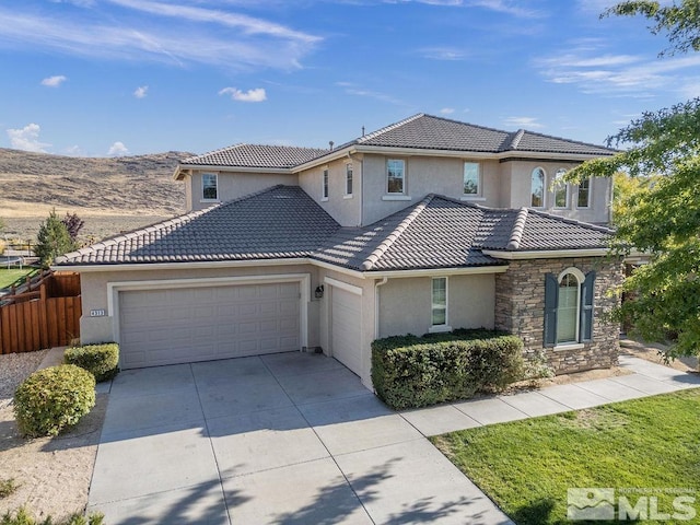 view of front of house with a garage