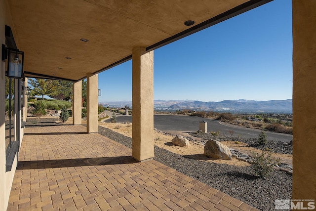 view of patio with a mountain view