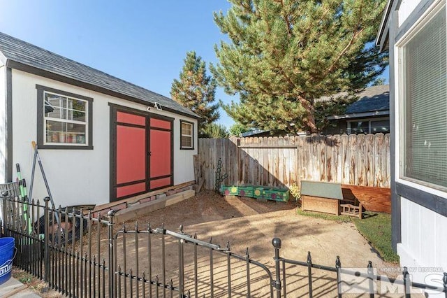 view of patio with a storage unit