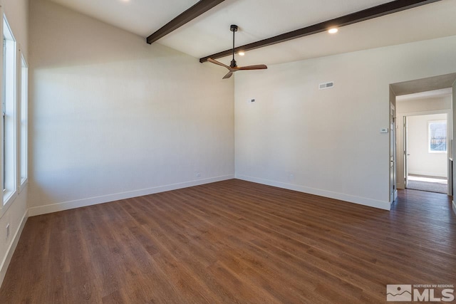 empty room featuring dark hardwood / wood-style flooring, beamed ceiling, and ceiling fan