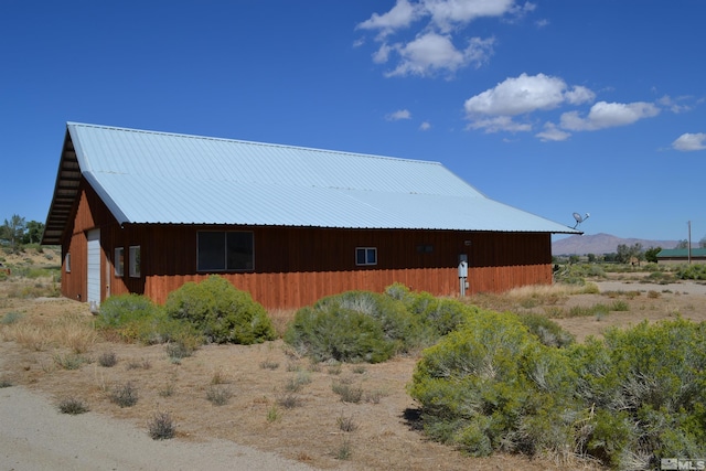 view of outdoor structure featuring a mountain view