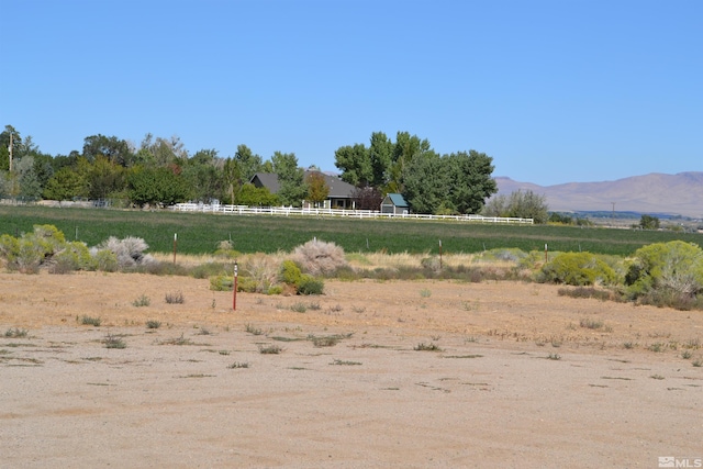 mountain view featuring a rural view