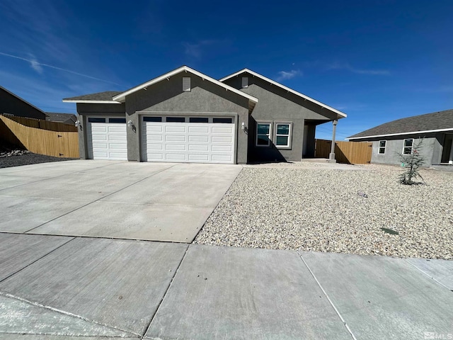 ranch-style house featuring a garage