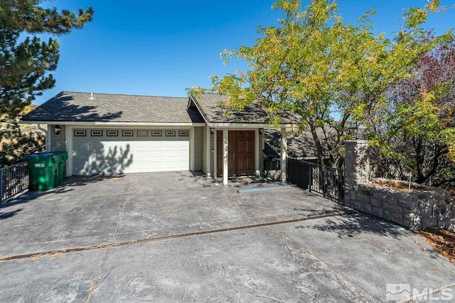 view of front of property with a garage