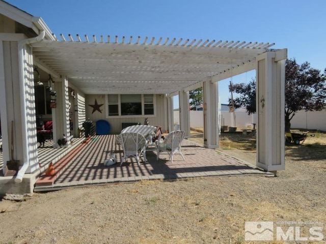 view of patio featuring a pergola