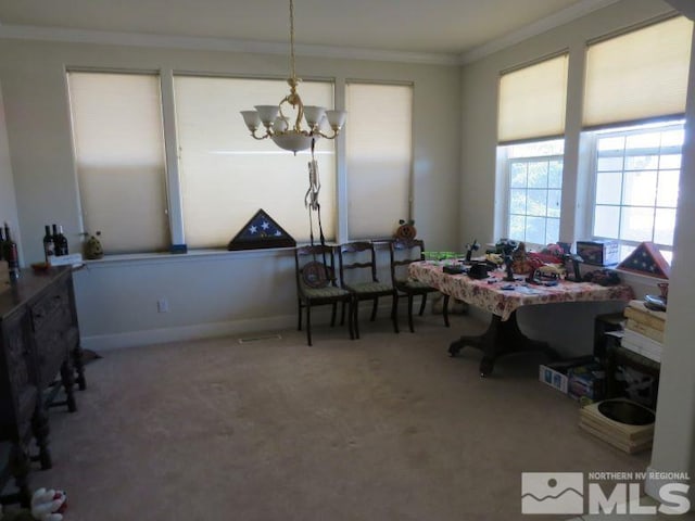 interior space featuring crown molding and a notable chandelier